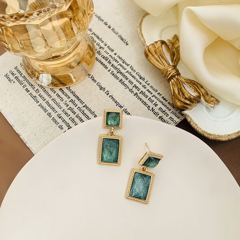 Pendientes de clip cuadrados de cristal verde vintage